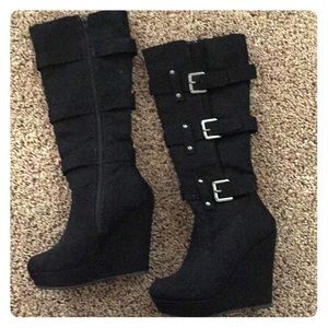 Black wedge boots with silver tarnished buckles